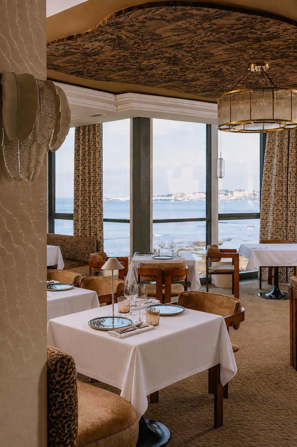 Main Restaurant — dining room with Atlantic views and warm natural light