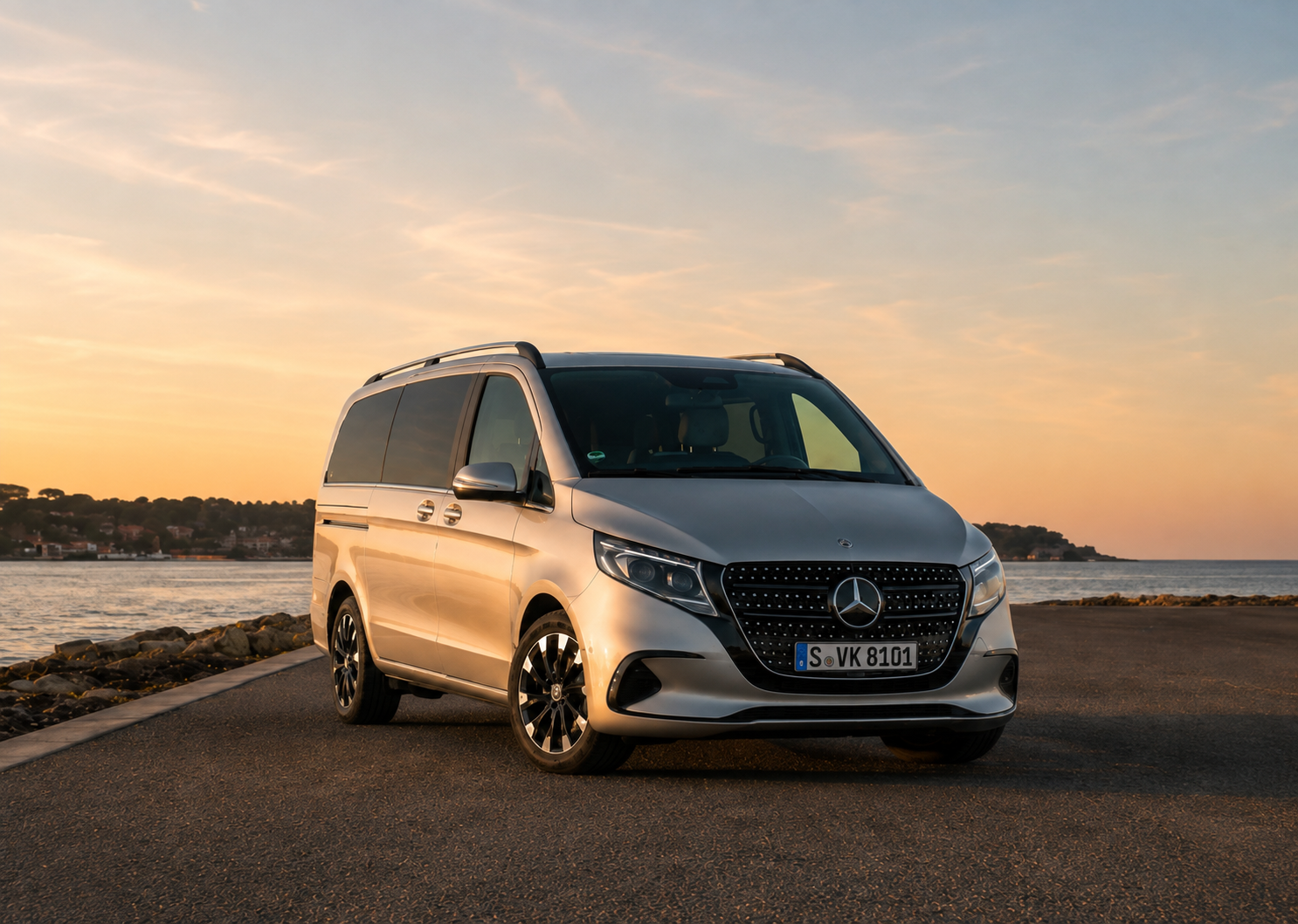 Mercedes shuttle van by the coast at sunset